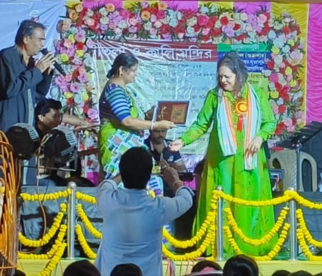 Banasri Ghoshal being felicitated at a temple cultural programme
