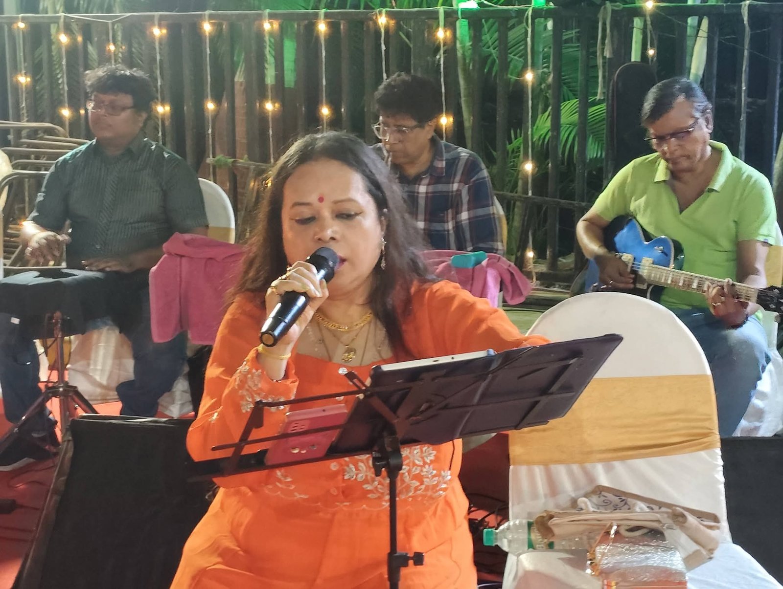 Banasri Ghoshal singing at an open-air evening programme