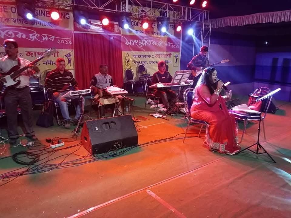 Banasri Ghoshal performing at an outdoor cultural festival